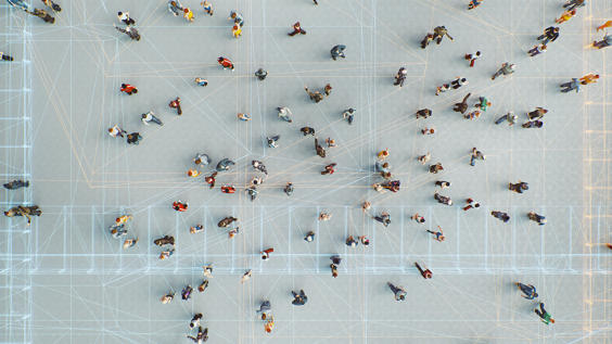 Aerial view of people with digital nodes